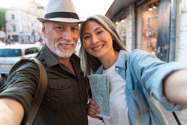 Close up people taking selfie together