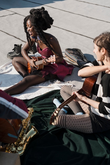 Close up people with instruments