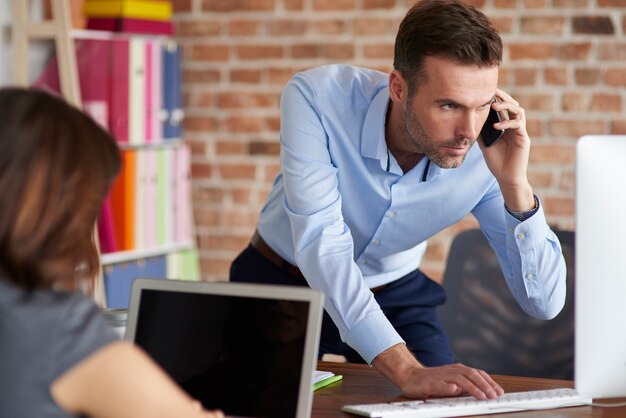 Close up on people working in the office