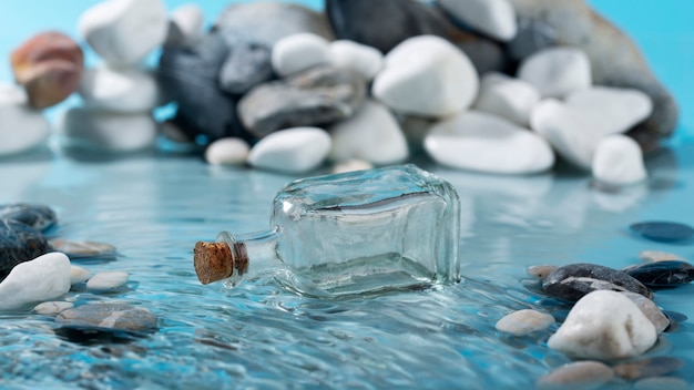 Free photo close up on perfume floating on water