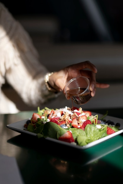 Free Photo close up on person enjoying food