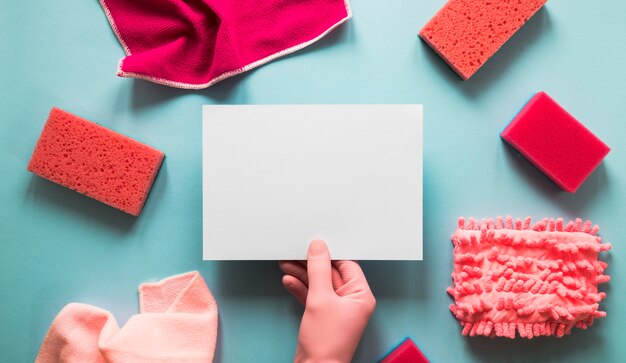 Close-up person holding a piece of paper