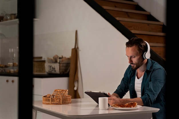 Free photo close up on person working at home at night