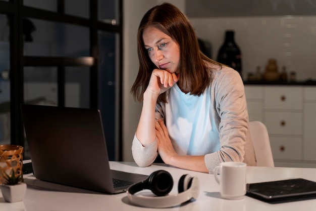 Close up on person working at home at night