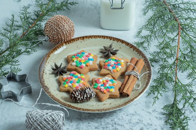 Close up photo of fresh homemade cookies on plate over white.