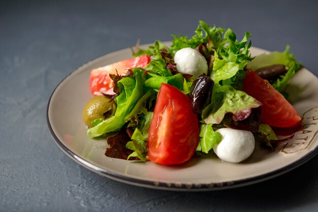 Close-up photo of spring vitamin fresh salad, healthy food with vegatables