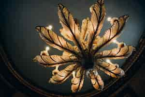 Free photo close up the picture of the unrealistic hanging chandelier