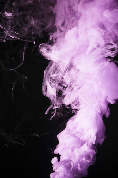 Free Photo close-up of pink smoke overlay texture on the black background