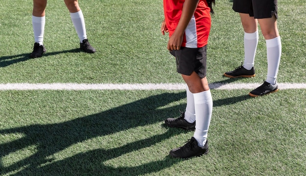 Close up players on football field