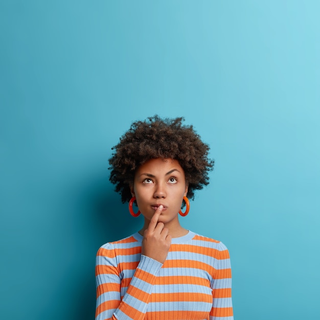 Close up portrait of an attractive young woman isolated