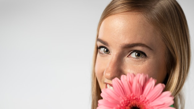 Close up portrait of beautiful woman with flowers