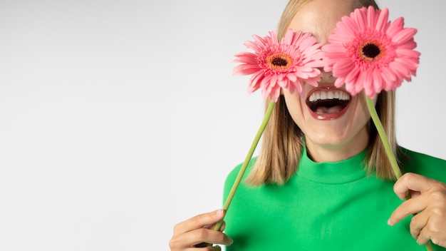 Close up portrait of beautiful woman with flowers