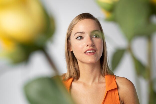 Close up portrait of beautiful woman with flowers