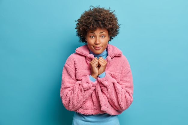 Free Photo close up portrait of curly haired young woman isolated