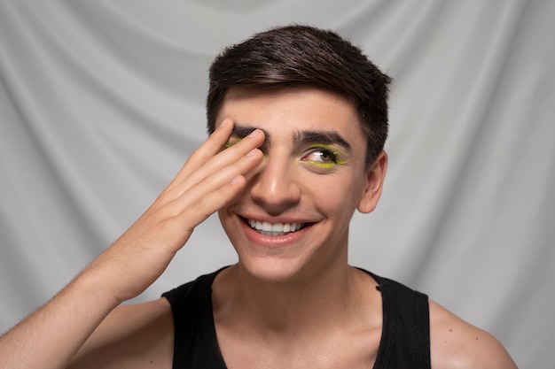 Free Photo close up portrait of person wearing make up liner