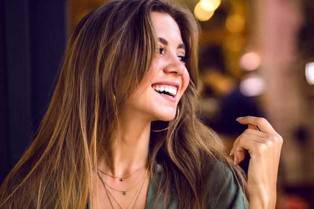 Close up portrait of portrait magnificent young sensual model with long brown hairs and shy cute smile, natural pure beauty, soft make up .