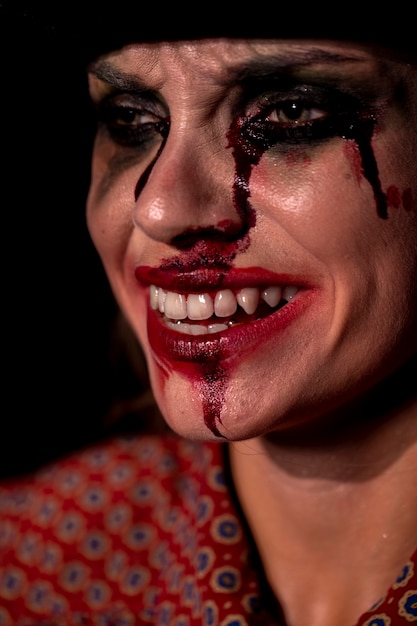 Close-up portrait of smiley make-up woman 