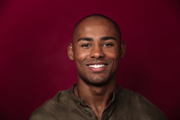 Close up portrait of smiling african man looking