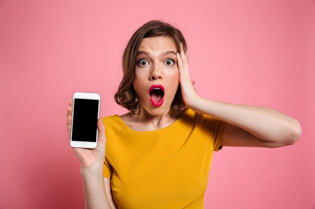 Close up portrait of a surprised young woman