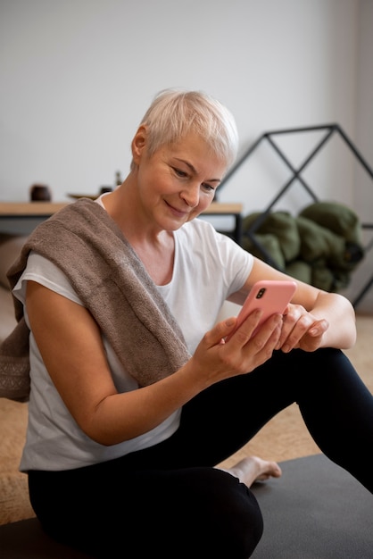 Free photo close up portrait of woman doing yoga