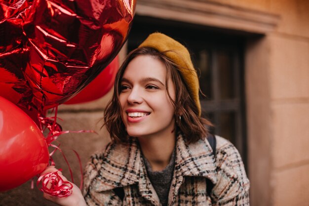 Close-up portrait of woman in stylish French beret