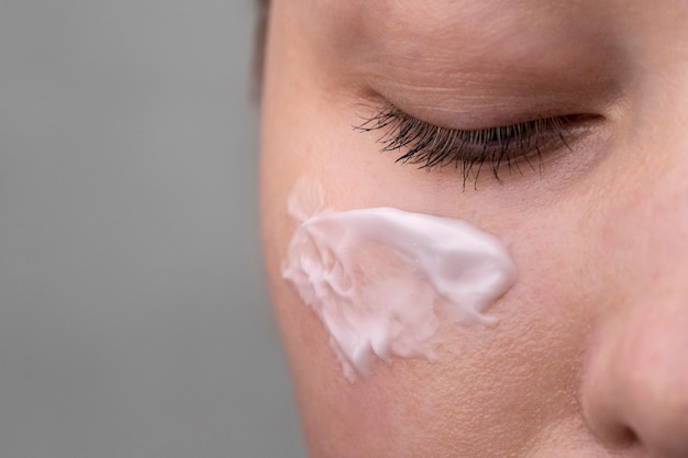 Close up portrait of woman with hydrated skin