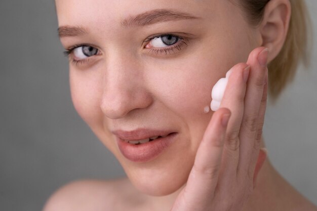 Close up portrait of woman with hydrated skin