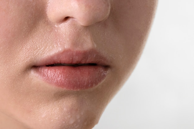 Free Photo close up portrait of woman with hydrated skin