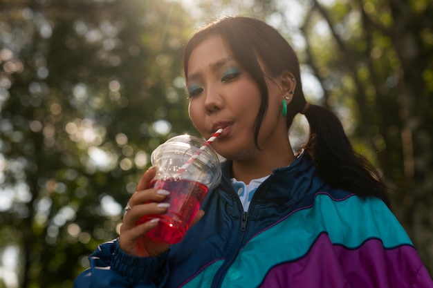 Close up portrait of woman with slurpee