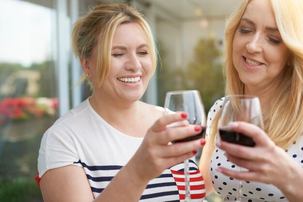 Close up portrait of women wine on the balcony