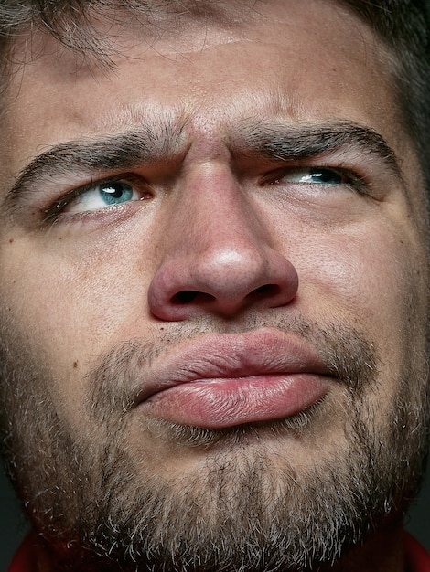 Free photo close up portrait of young and emotional caucasian man