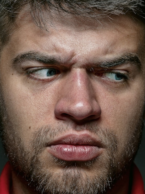 Free photo close up portrait of young and emotional caucasian man