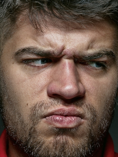 Free photo close up portrait of young and emotional caucasian man