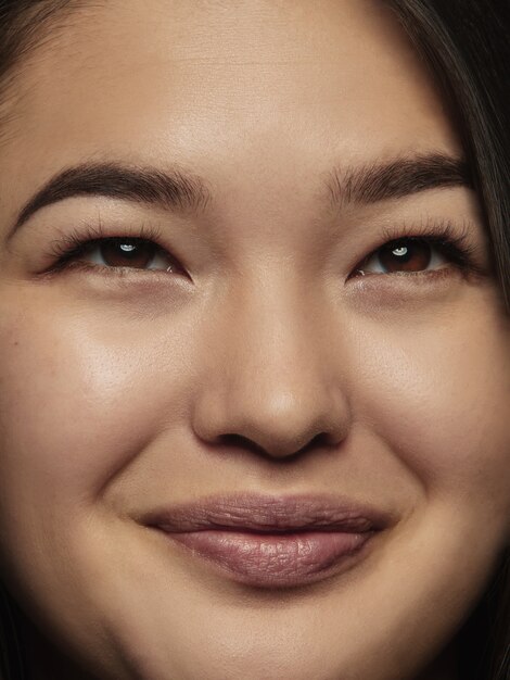 Close up portrait of young and emotional chinese woman.