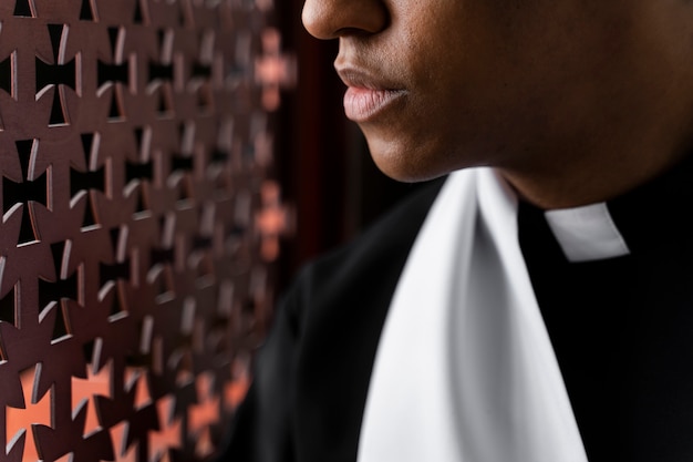 Free photo close up priest listening to confession