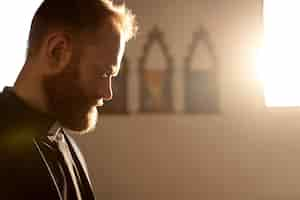 Free photo close up on priest praying