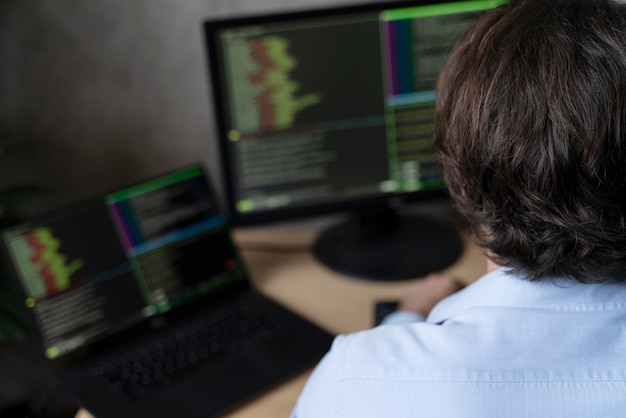 Free photo close up programmer at desk