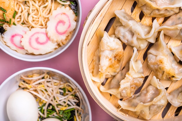 Close-up ramen soup and dumplings