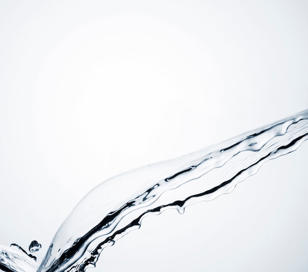 Close-up realistic water splash on white background