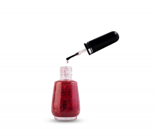 Close up of Red Nail polish isolated on white background.