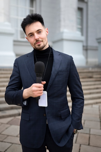 Close up on reporter preparing for an interview