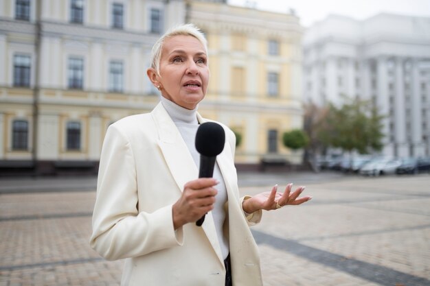 Close up on reporter preparing for an interview