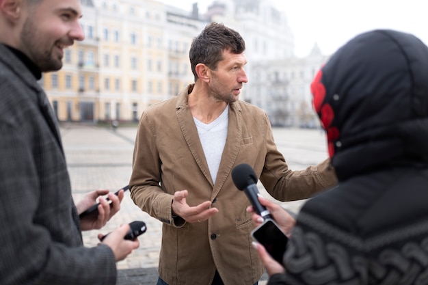 Close up on reporter taking an interview