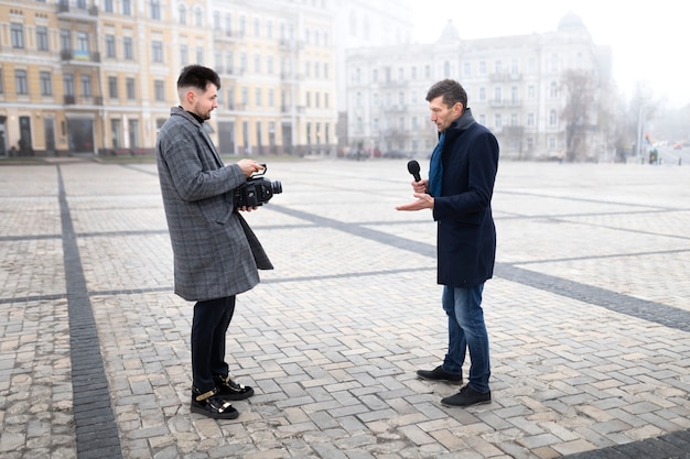 Close up on reporter taking an interview