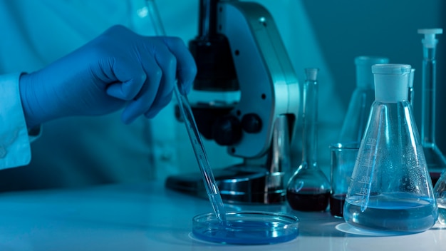 Close-up researcher working in laboratory