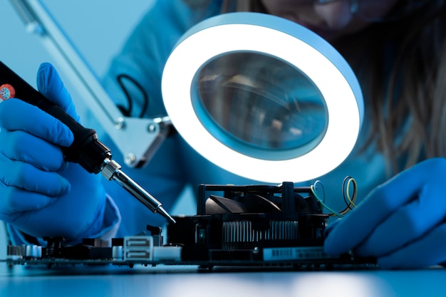 Close up researcher working with lamp