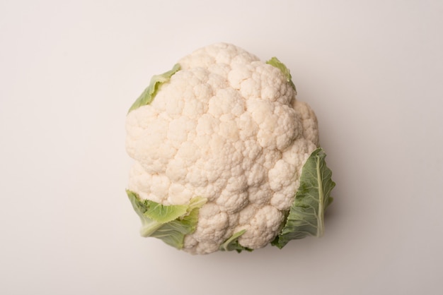 Close up of a ripe cauliflower isolated over white