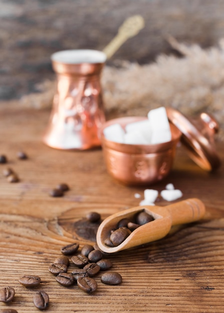 Close-up roasted coffee beans with sugar