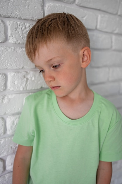 Free photo close up on sad boy portrait