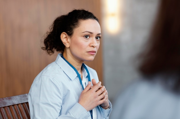 Close up sad woman in therapy